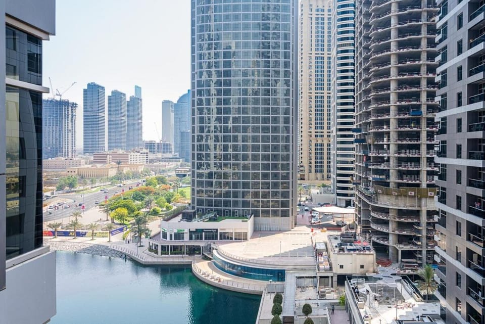 1BR Gem with Lake and Sea View Plus Pool and Gym Access Apartment in Dubai