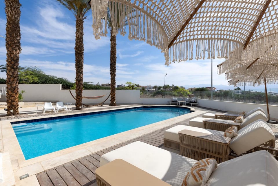 Swimming pool, sunbed