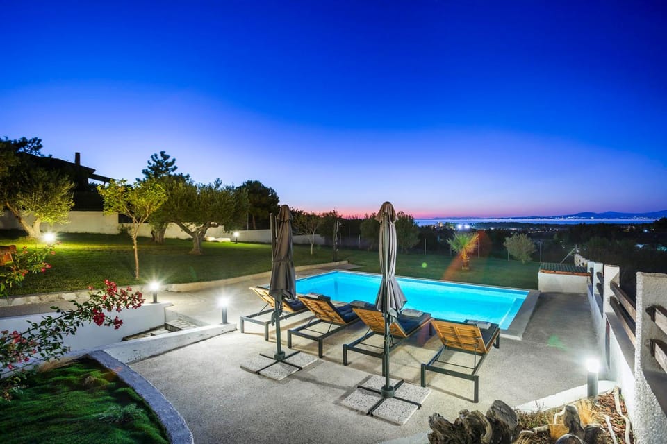 Property building, Night, Natural landscape, Pool view, Swimming pool