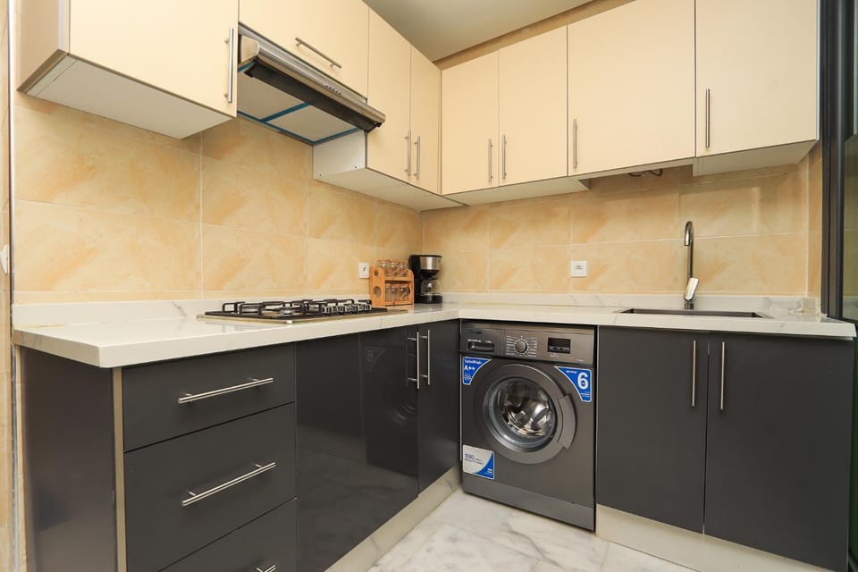 Kitchen or kitchenette, washing machine