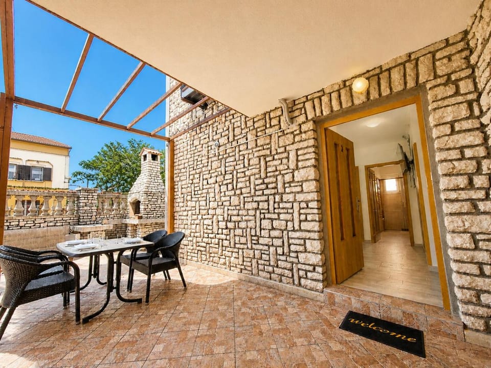 Property building, Patio, Balcony/Terrace, Seating area