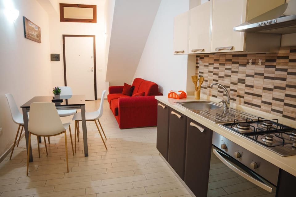 Kitchen or kitchenette, Living room, Seating area, Dining area