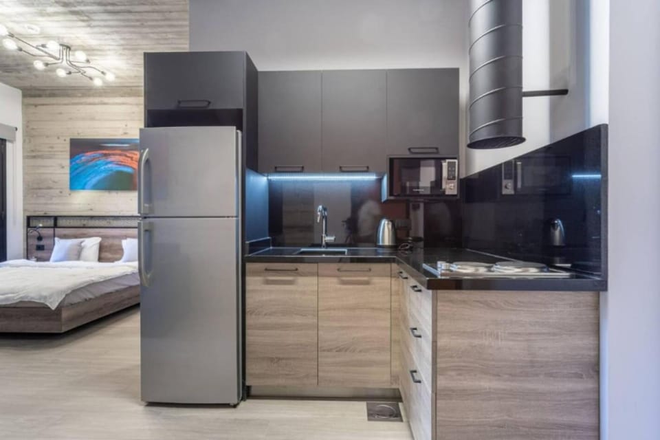 Bed, Kitchen or kitchenette, stove