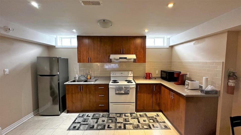 Kitchen or kitchenette, oven, stove, toaster