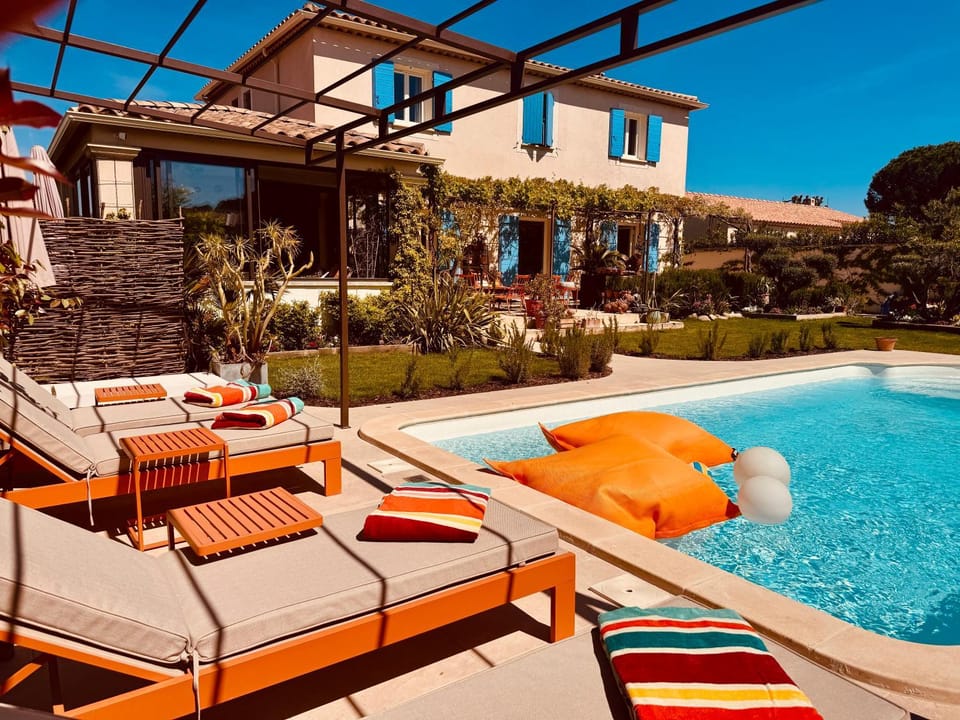 Property building, Day, Pool view, sunbed