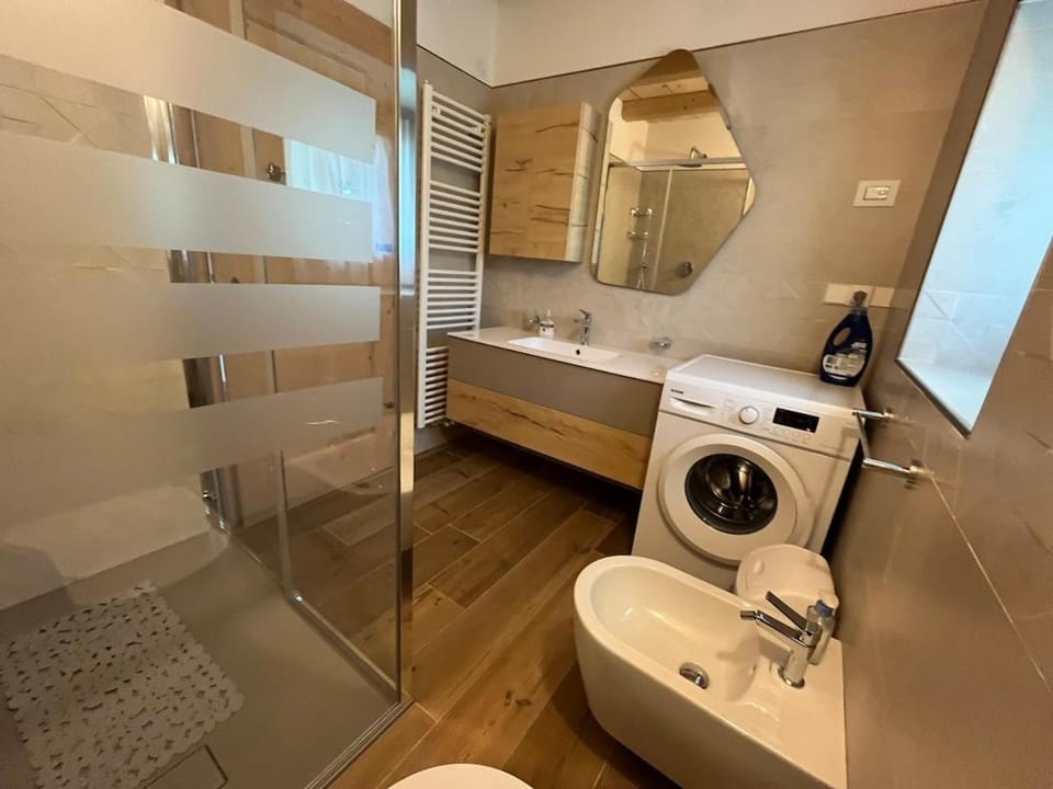 Shower, Toilet, Bathroom, towels, washing machine, dryer