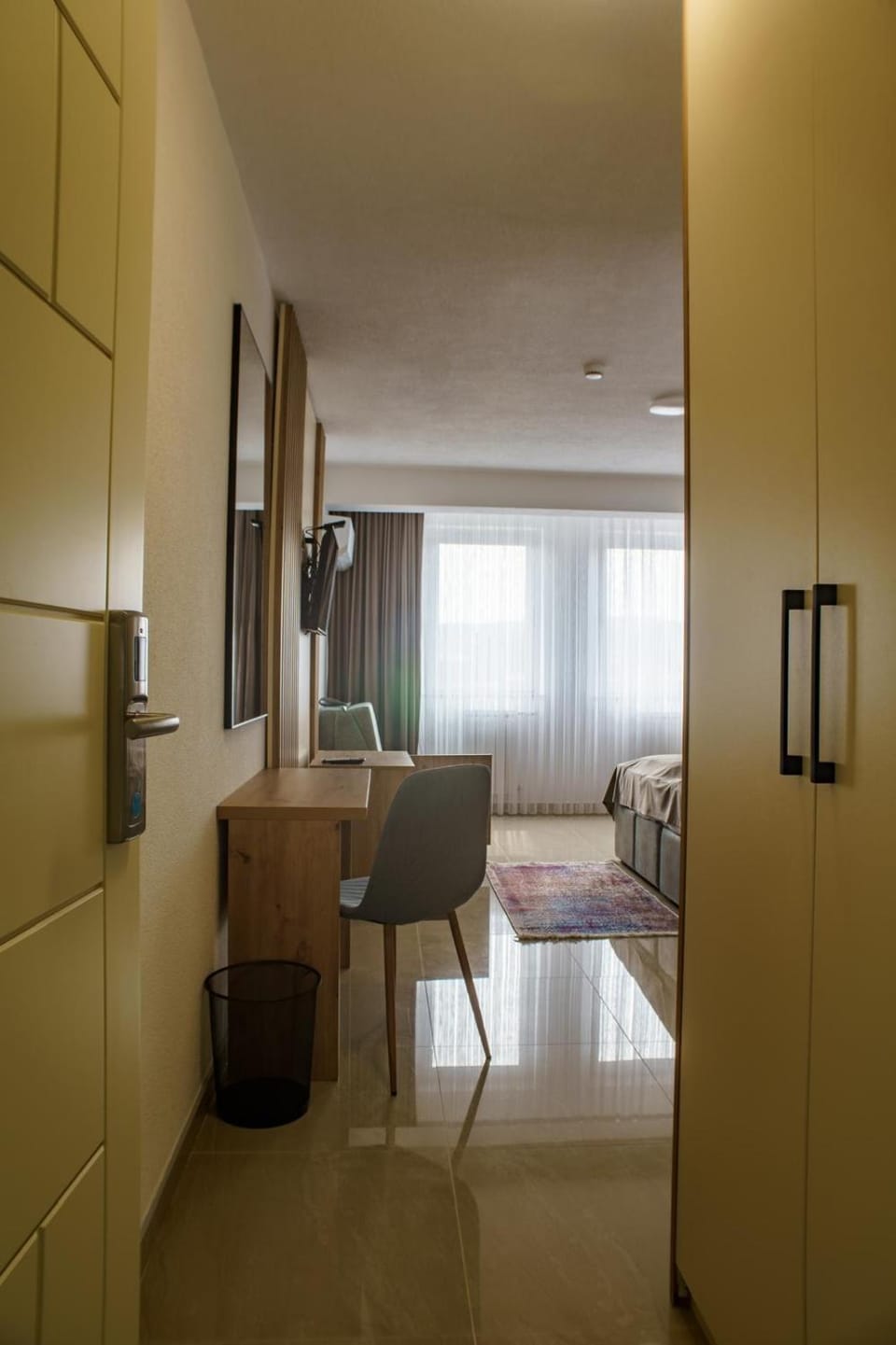 Seating area, minibar, wardrobe