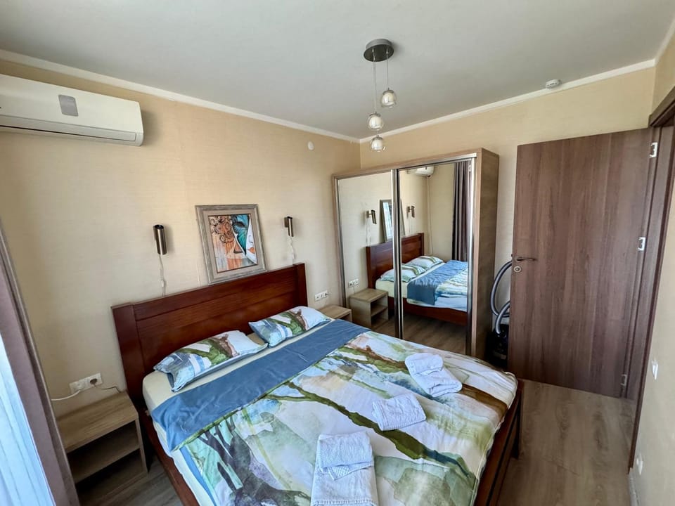 Bed, Bedroom, towels, wardrobe, air conditioner