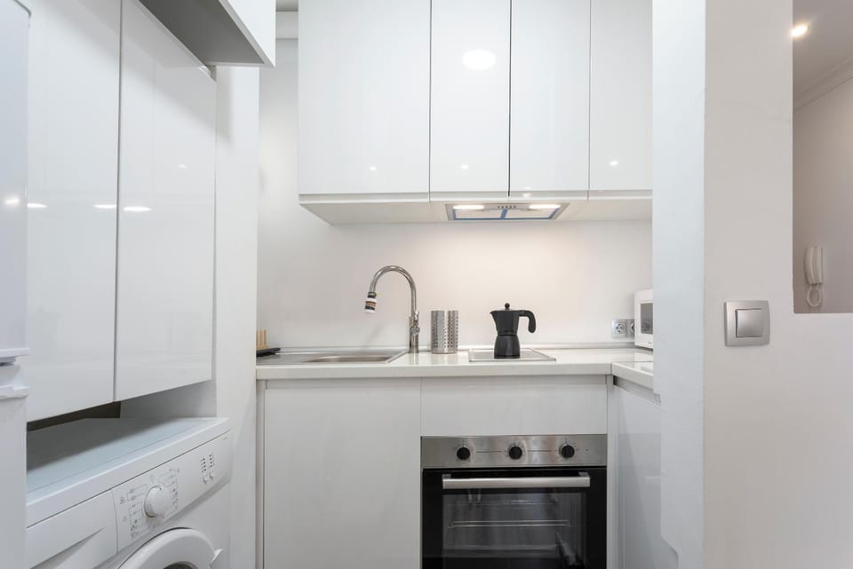 Kitchen or kitchenette, microwave, oven, washing machine, kitchen