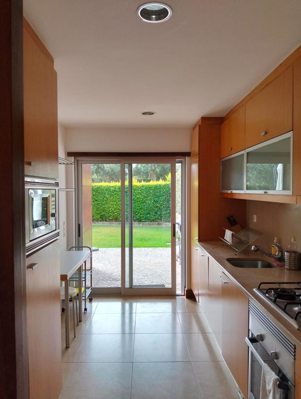Kitchen or kitchenette, dishwasher, oven, stove, toaster