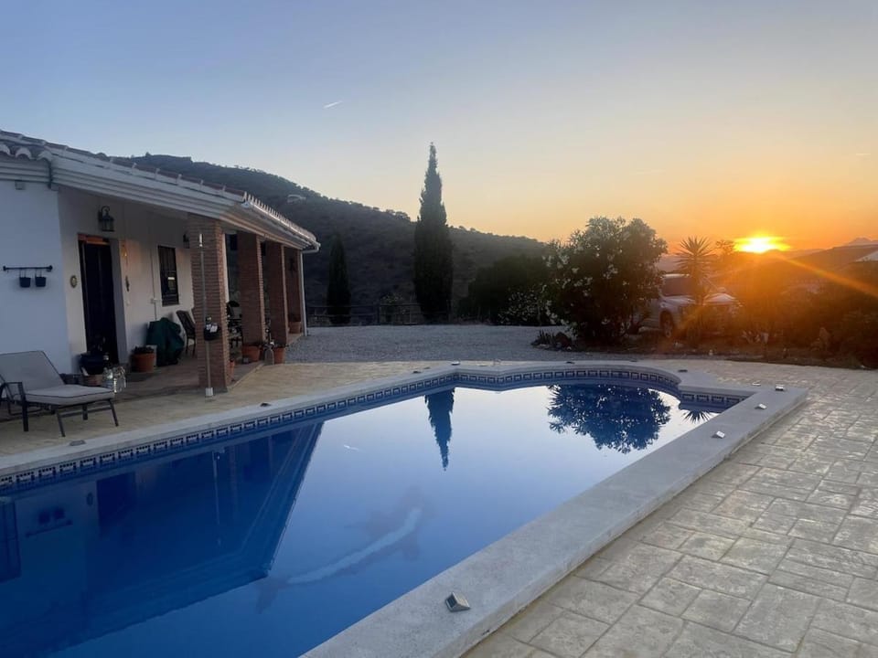 Property building, Natural landscape, Pool view, Swimming pool, Sunset, sunbed