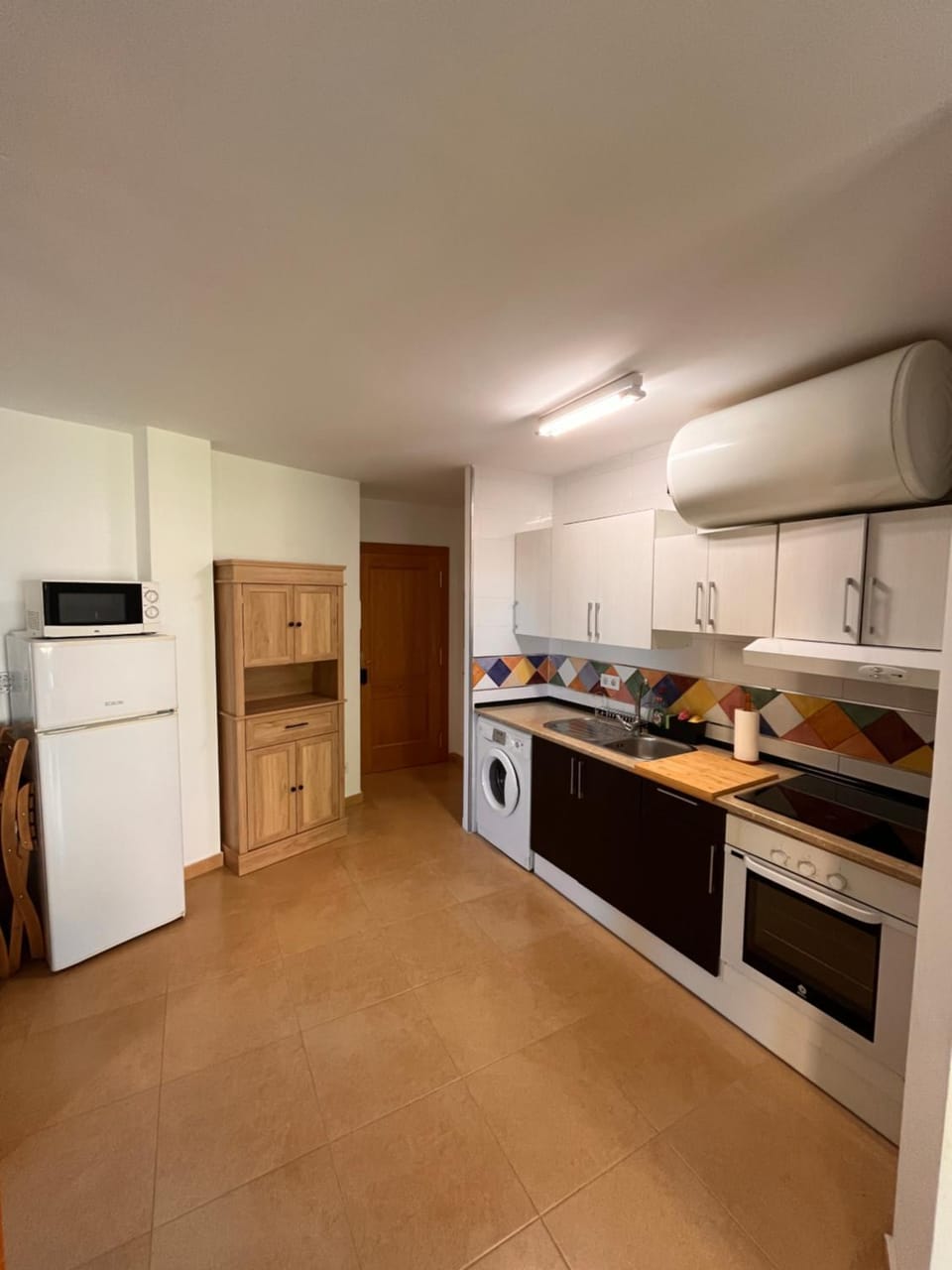 Kitchen or kitchenette, oven, stove, toaster