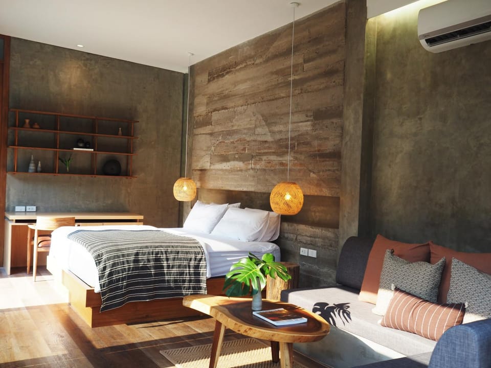 Bed, Living room, Seating area, Bedroom