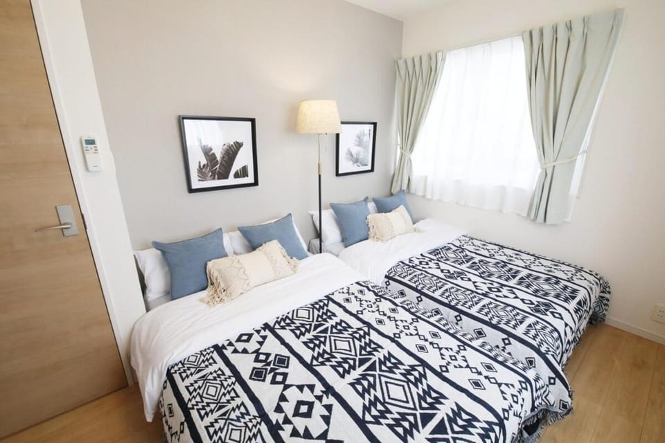 blue sea and house Apartment in Okinawa Prefecture