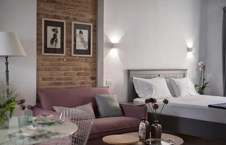 Bed, Living room, Seating area, Bedroom