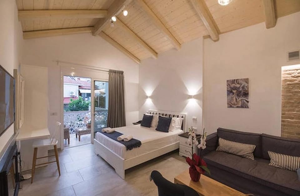 Bed, Living room, Seating area, Bedroom