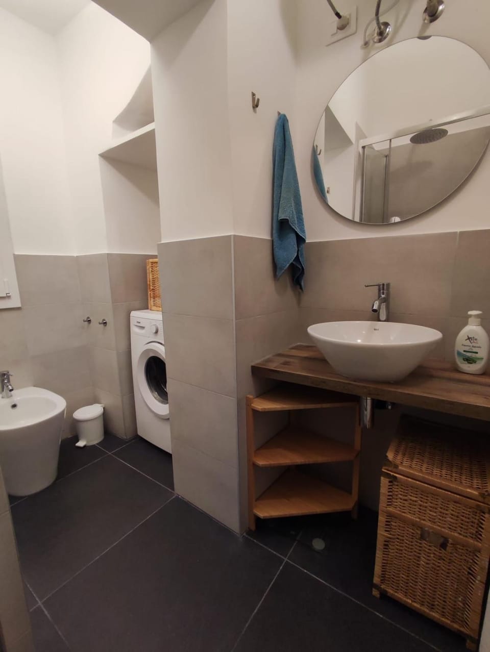 Shower, Toilet, Bathroom, bidet, towels, washing machine, dryer