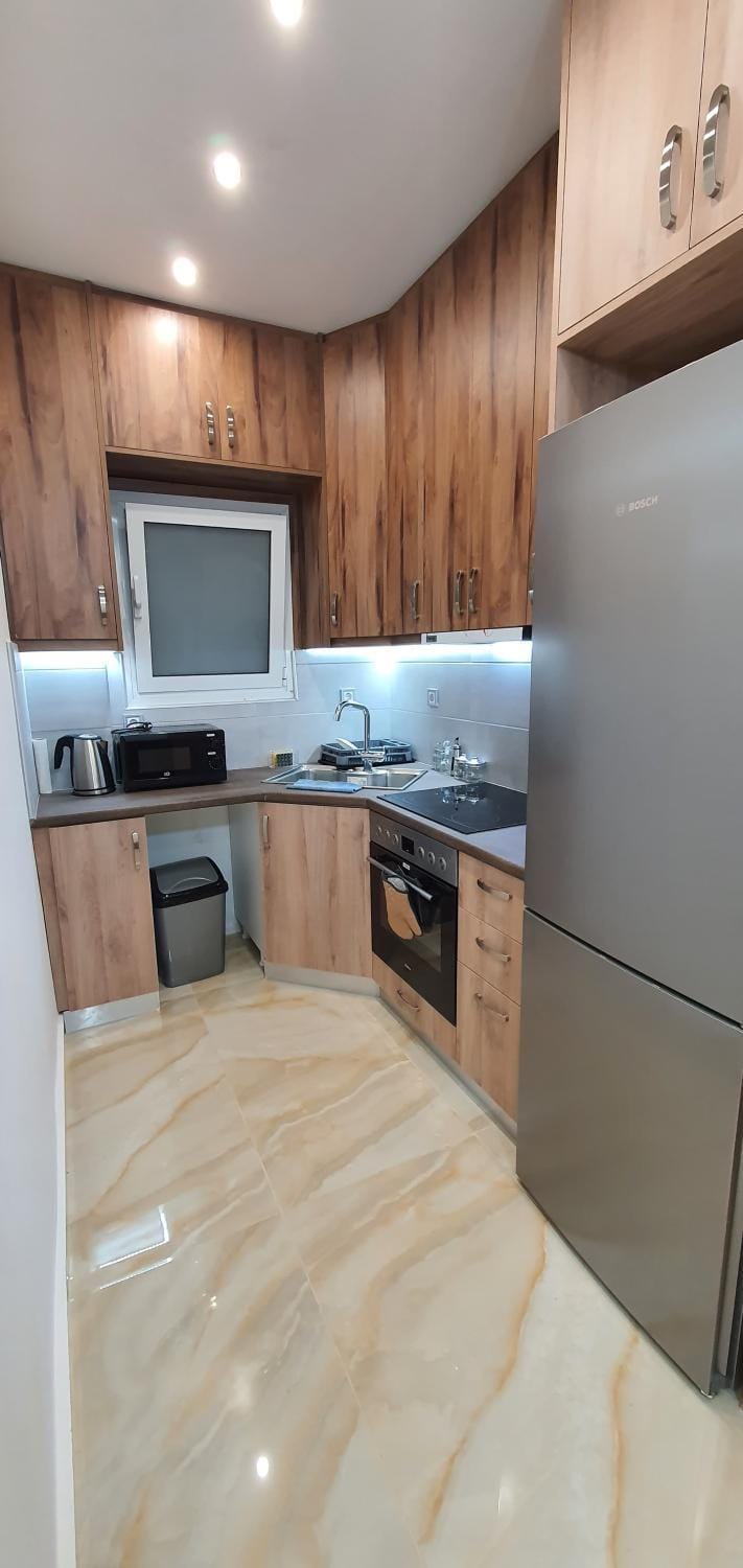 Kitchen or kitchenette, oven