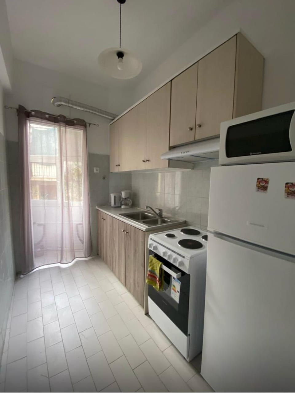 Kitchen or kitchenette, oven, stove