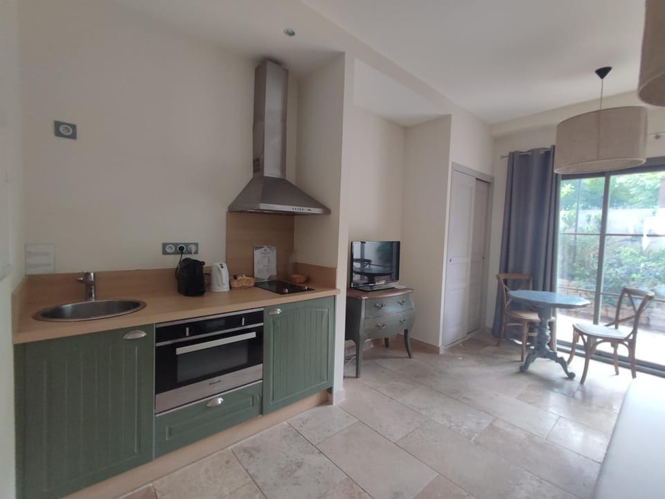 Kitchen or kitchenette, stove