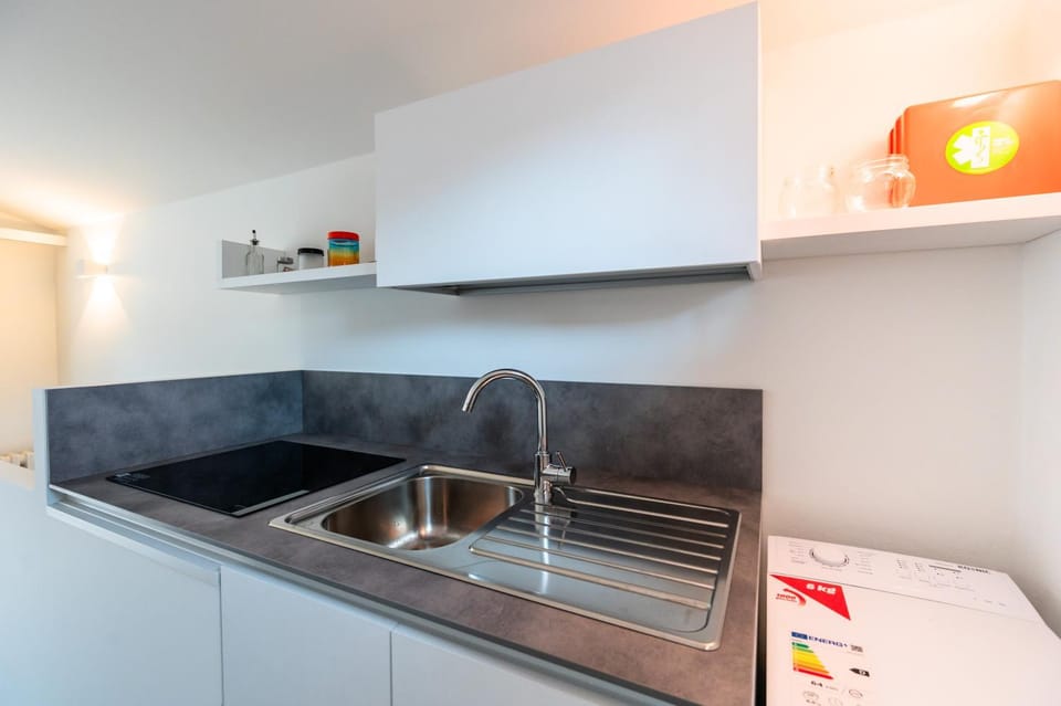 Kitchen or kitchenette, stove