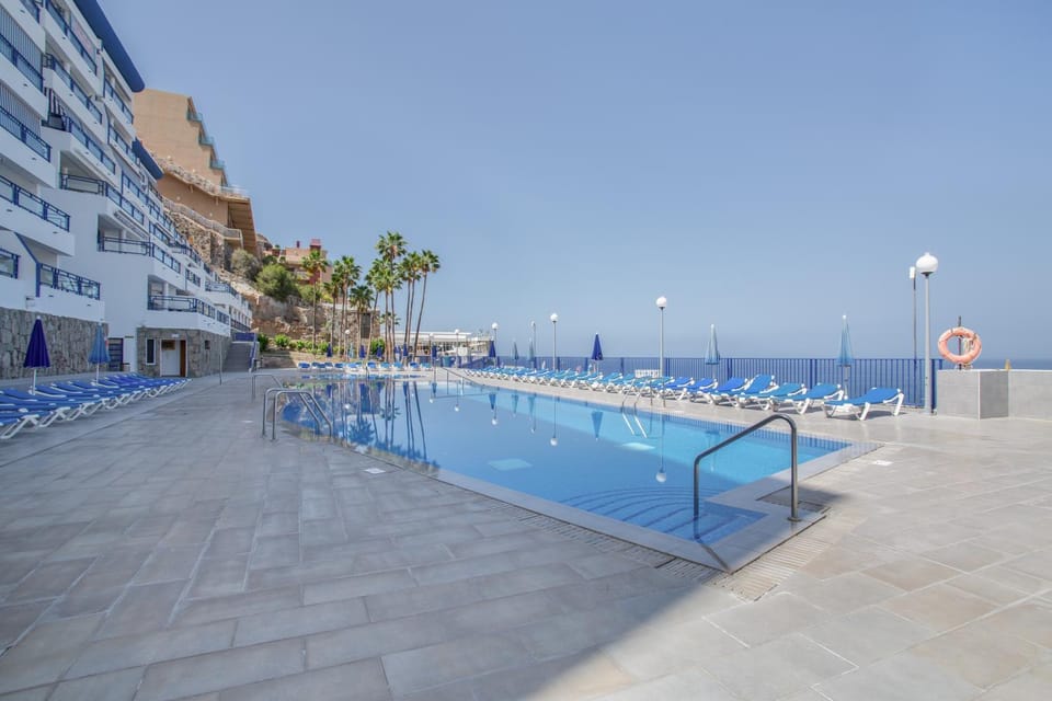 Property building, Living room, Swimming pool