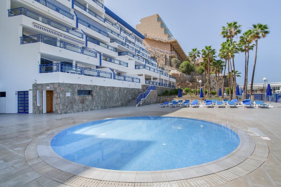 Property building, Living room, Swimming pool