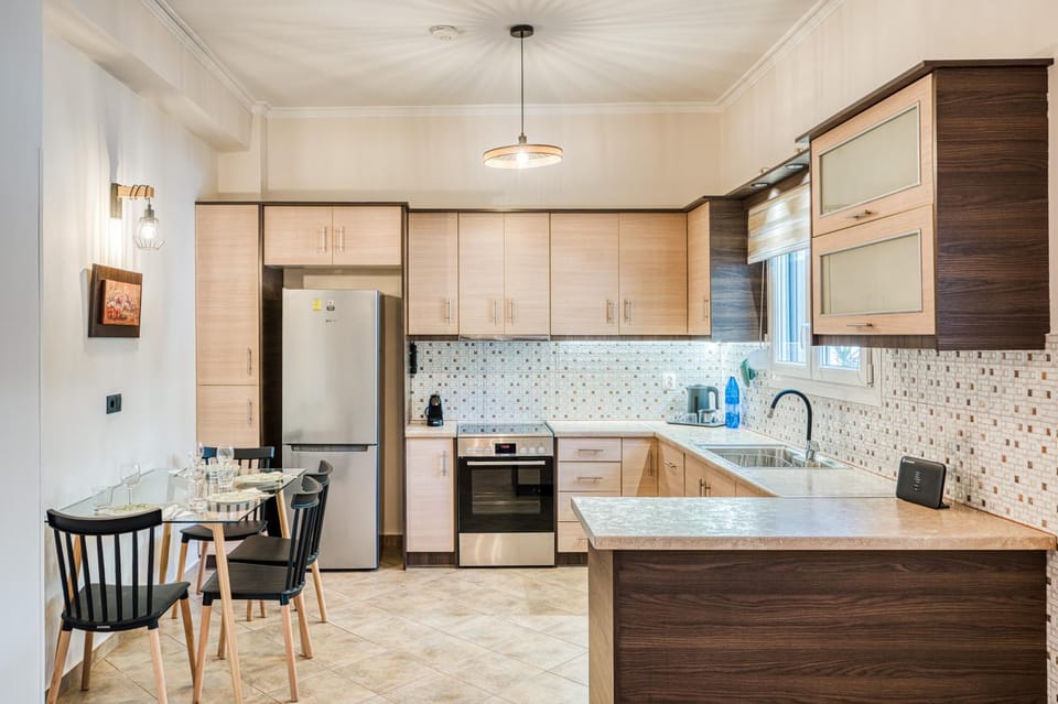 Kitchen or kitchenette, dishwasher, oven, stove