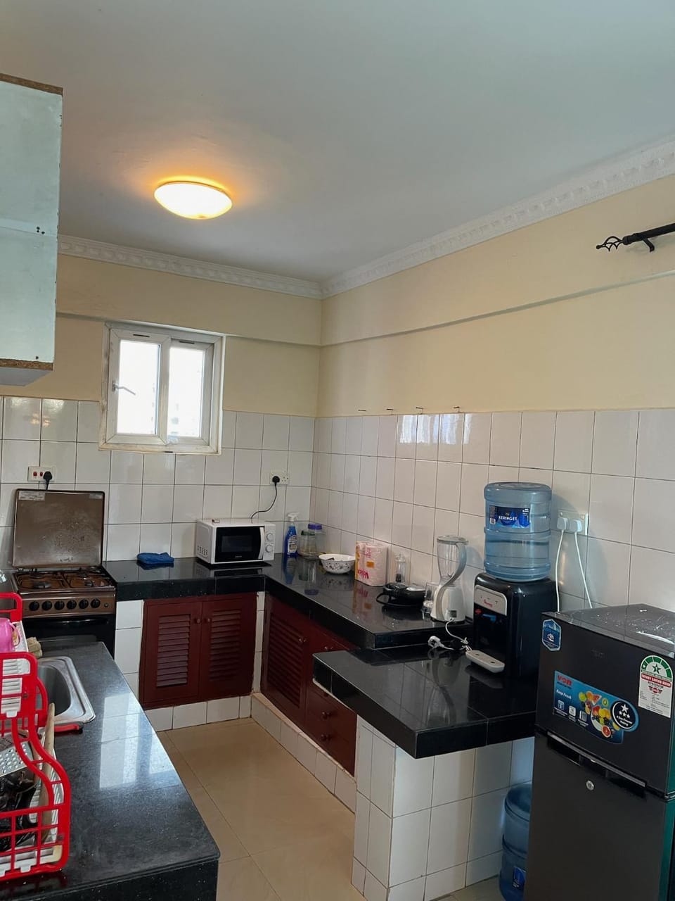 Kitchen or kitchenette, stove, toaster