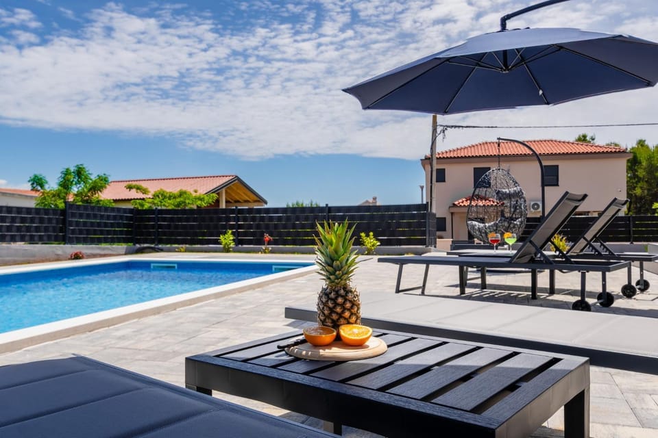 Property building, Day, View (from property/room), Swimming pool, sunbed