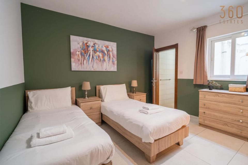 Central 4BR home with AC, Balcony, WIFI & Terrace by 360 Estates Apartment in Malta