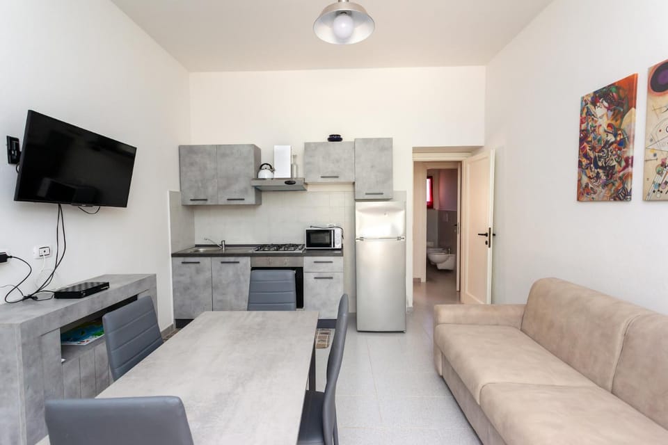 TV and multimedia, Kitchen or kitchenette, Living room, Seating area, Dining area, oven, stove
