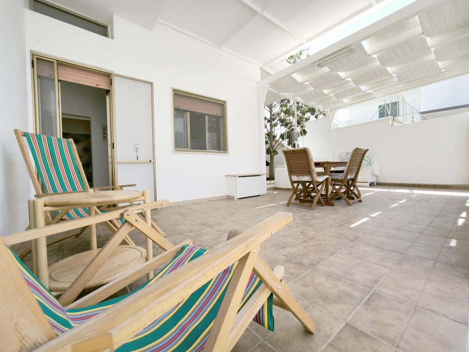 Patio, Living room, Seating area, sunbed