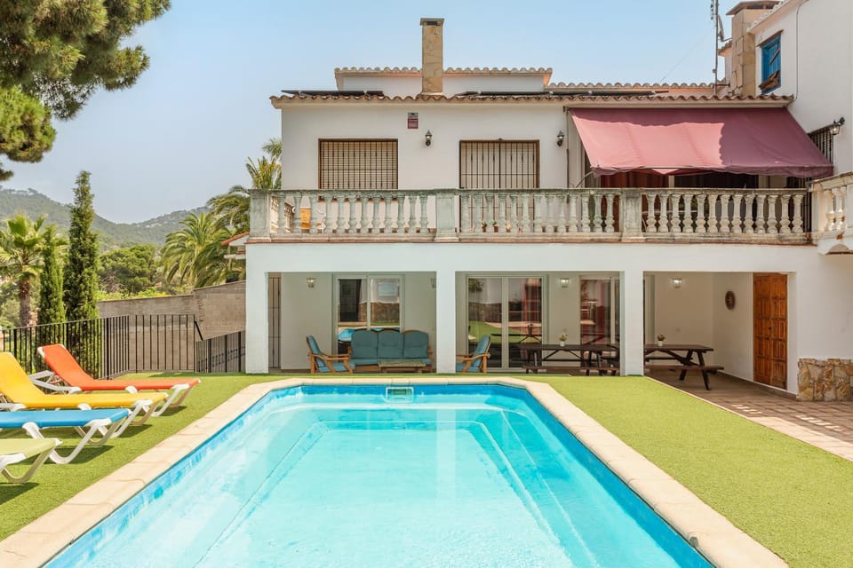 Property building, Living room, Swimming pool