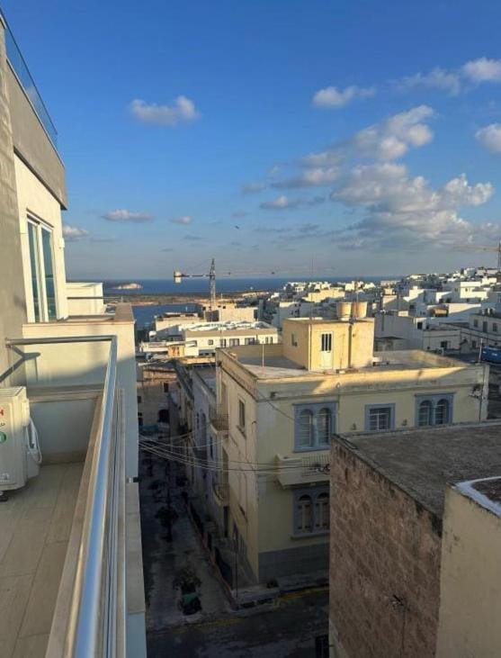 Property building, Day, Natural landscape, View (from property/room), Balcony/Terrace, City view, Sea view