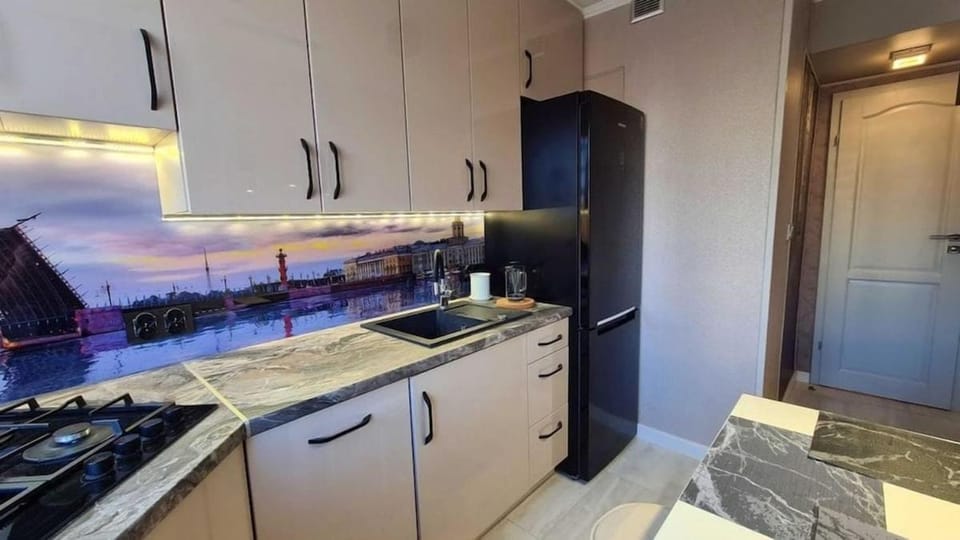 Kitchen or kitchenette, dishwasher, oven, stove