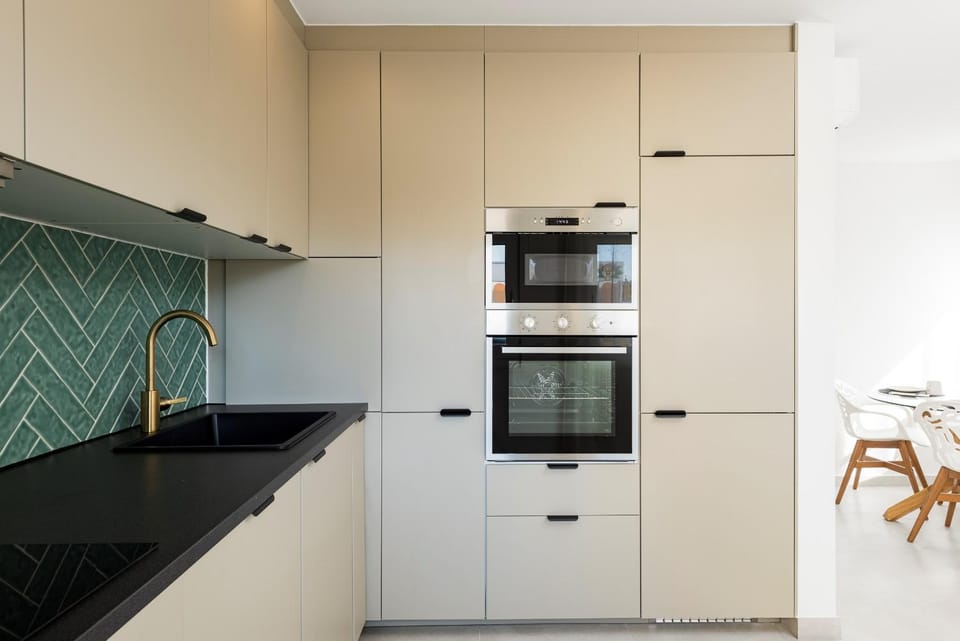 Kitchen or kitchenette, oven