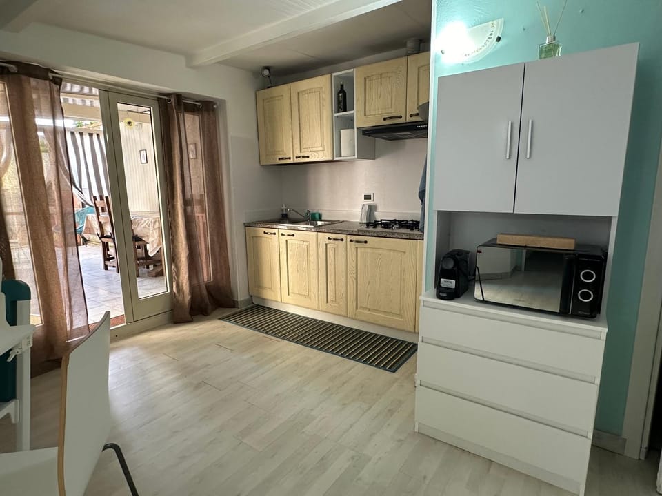 Kitchen or kitchenette, microwave