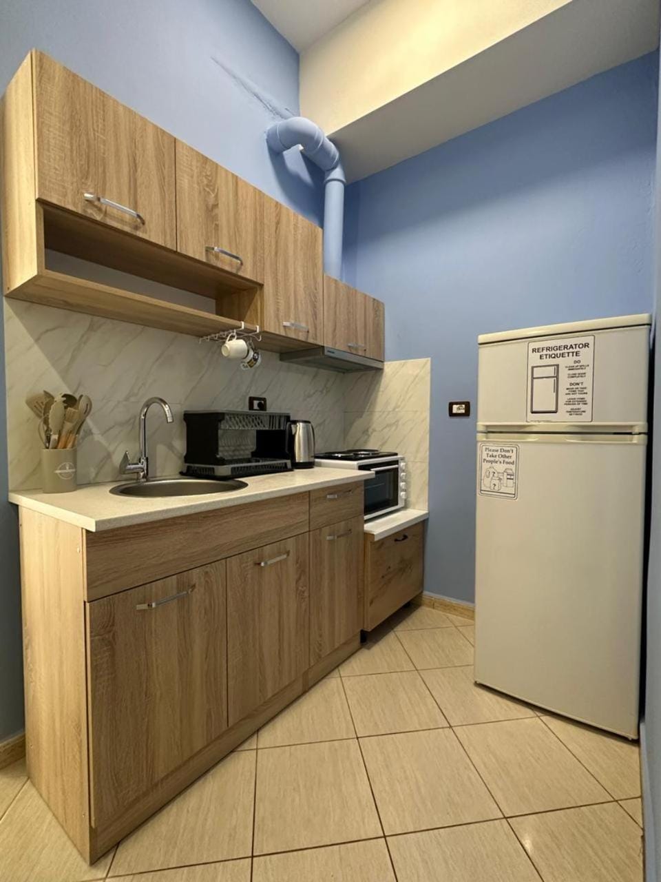 Kitchen or kitchenette, oven, stove