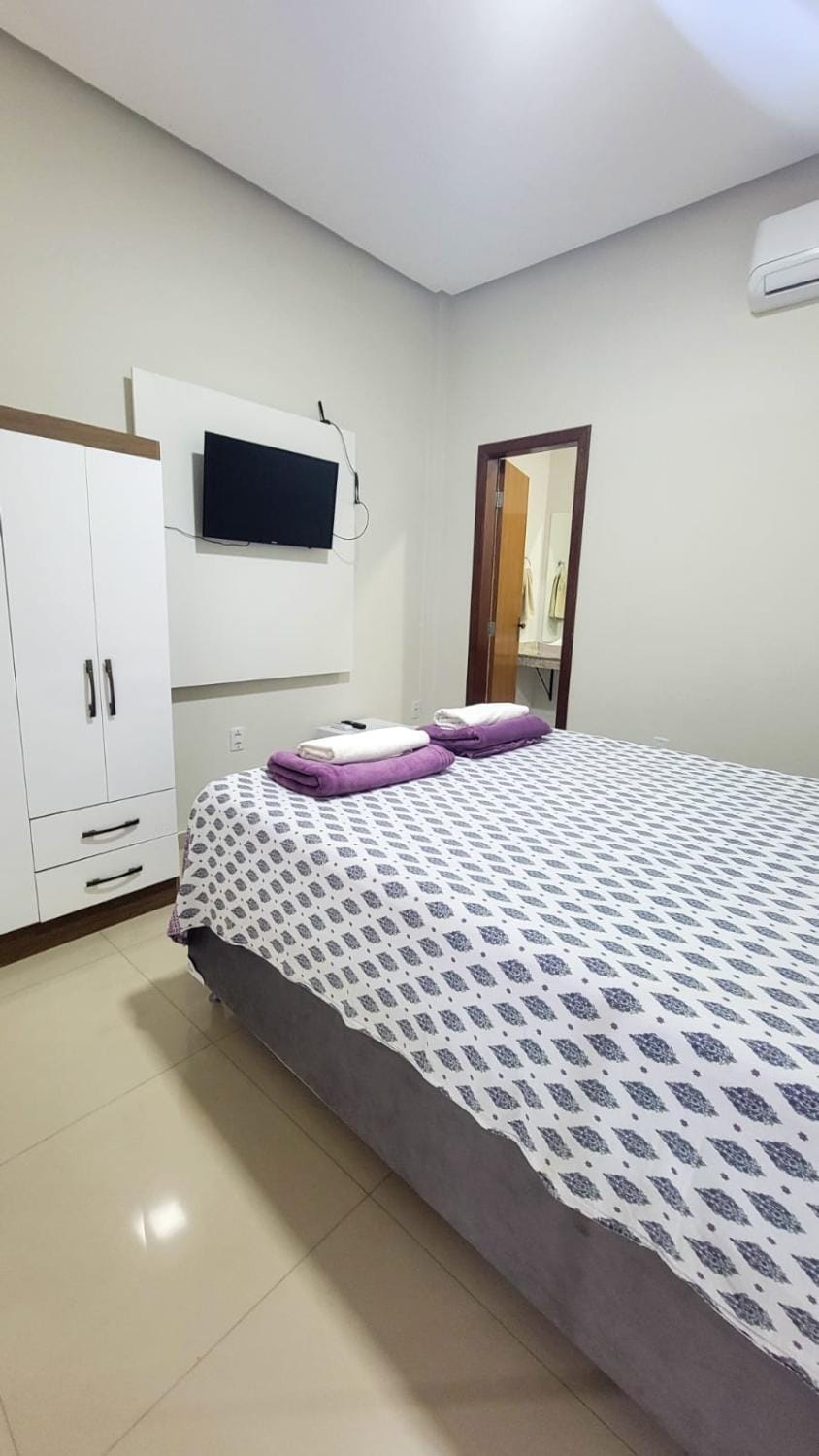 Bed, TV and multimedia, Bedroom, wardrobe, air conditioner