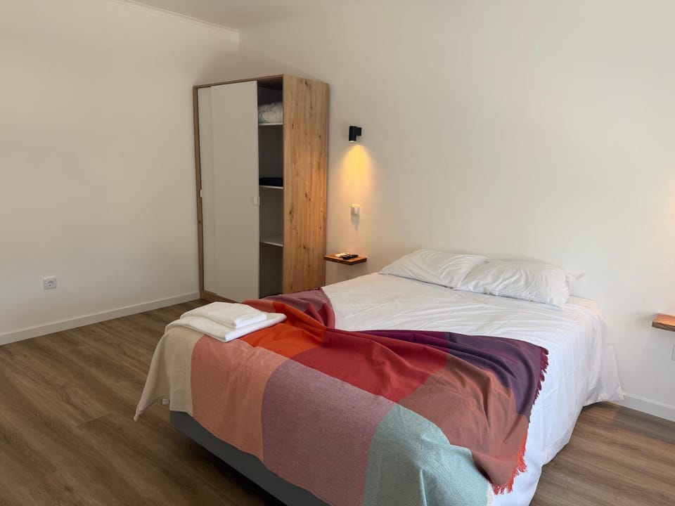 Bed, wardrobe