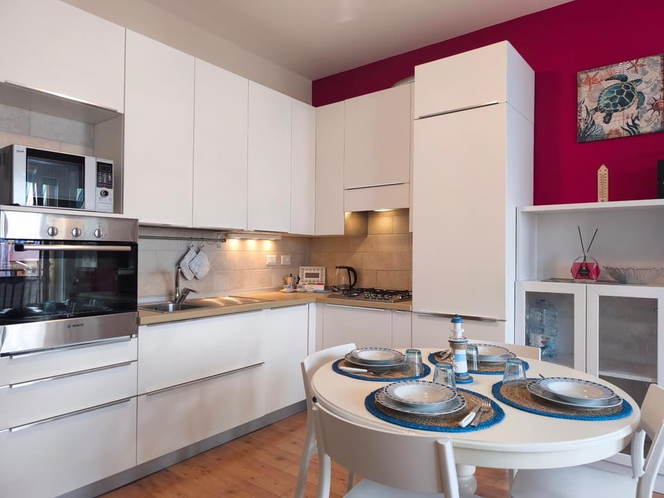 Kitchen or kitchenette, Dining area, microwave, oven, stove, kitchen