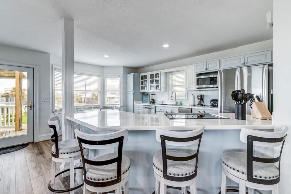 New Listing! Stunning Oceanfront 4-bedroom 3 bath house nestled on the quiet end of the island. House in Fernandina Beach