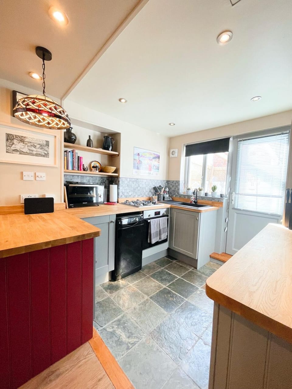 Kitchen or kitchenette, dishwasher, oven, stove, toaster