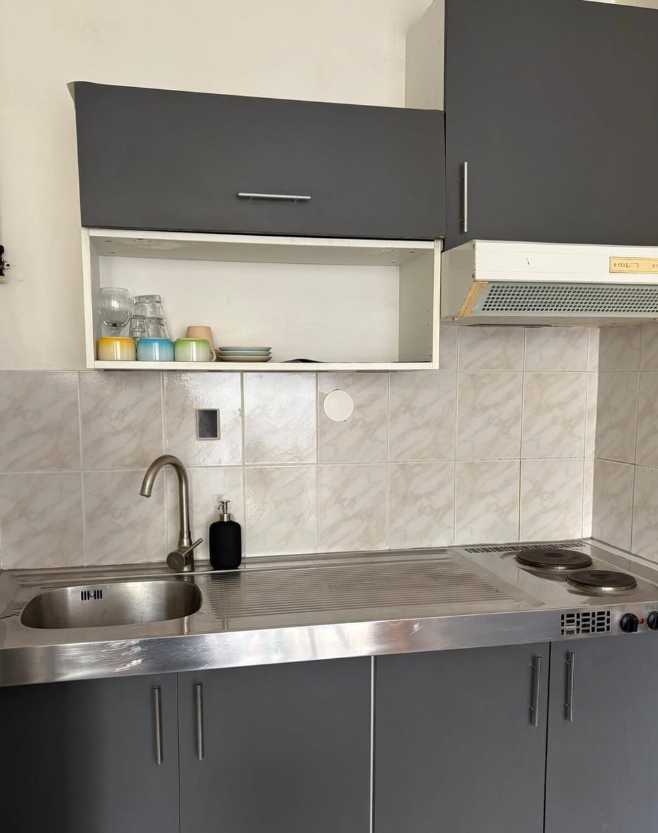 Kitchen or kitchenette, stove