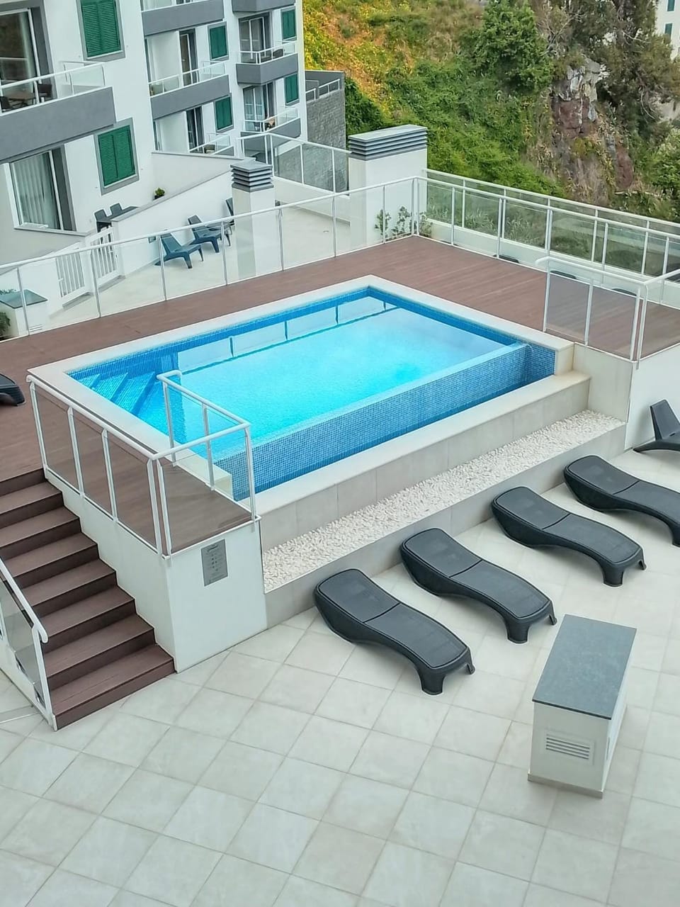 Swimming pool, sunbed