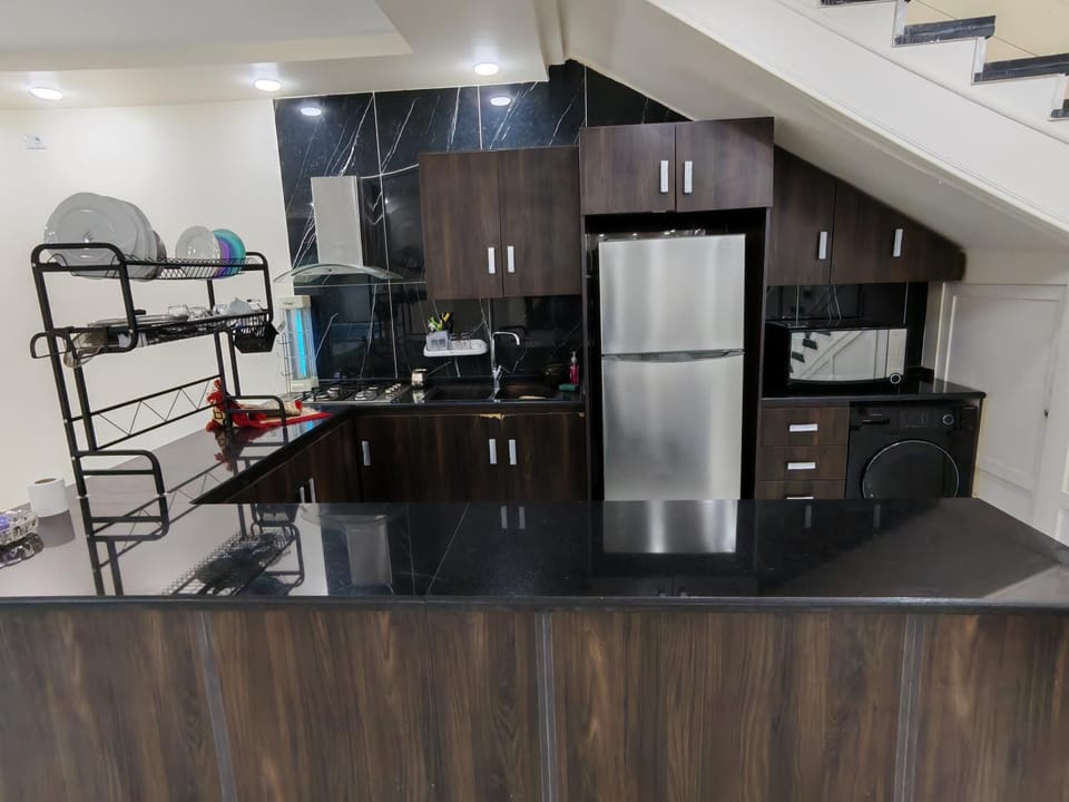 Kitchen or kitchenette, oven, stove