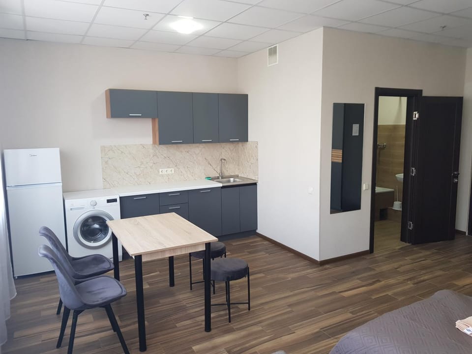 Kitchen or kitchenette, washing machine