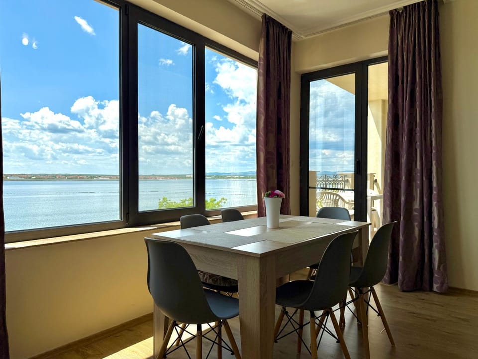 Natural landscape, Living room, Seating area, Dining area, Sea view