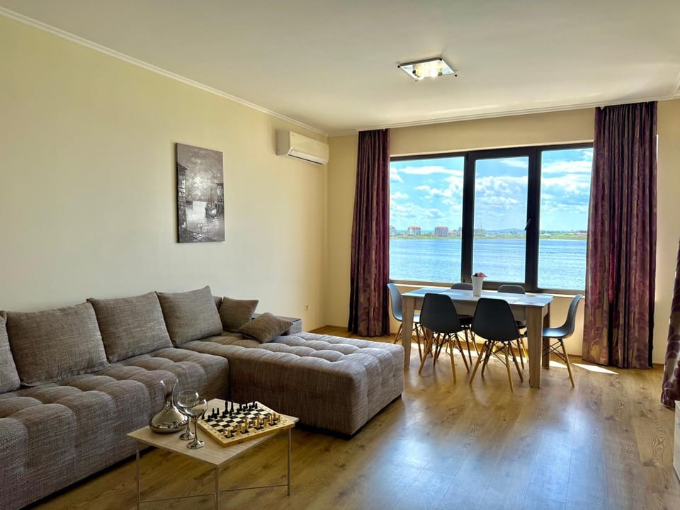 Natural landscape, Living room, Seating area, Dining area, Sea view, air conditioner
